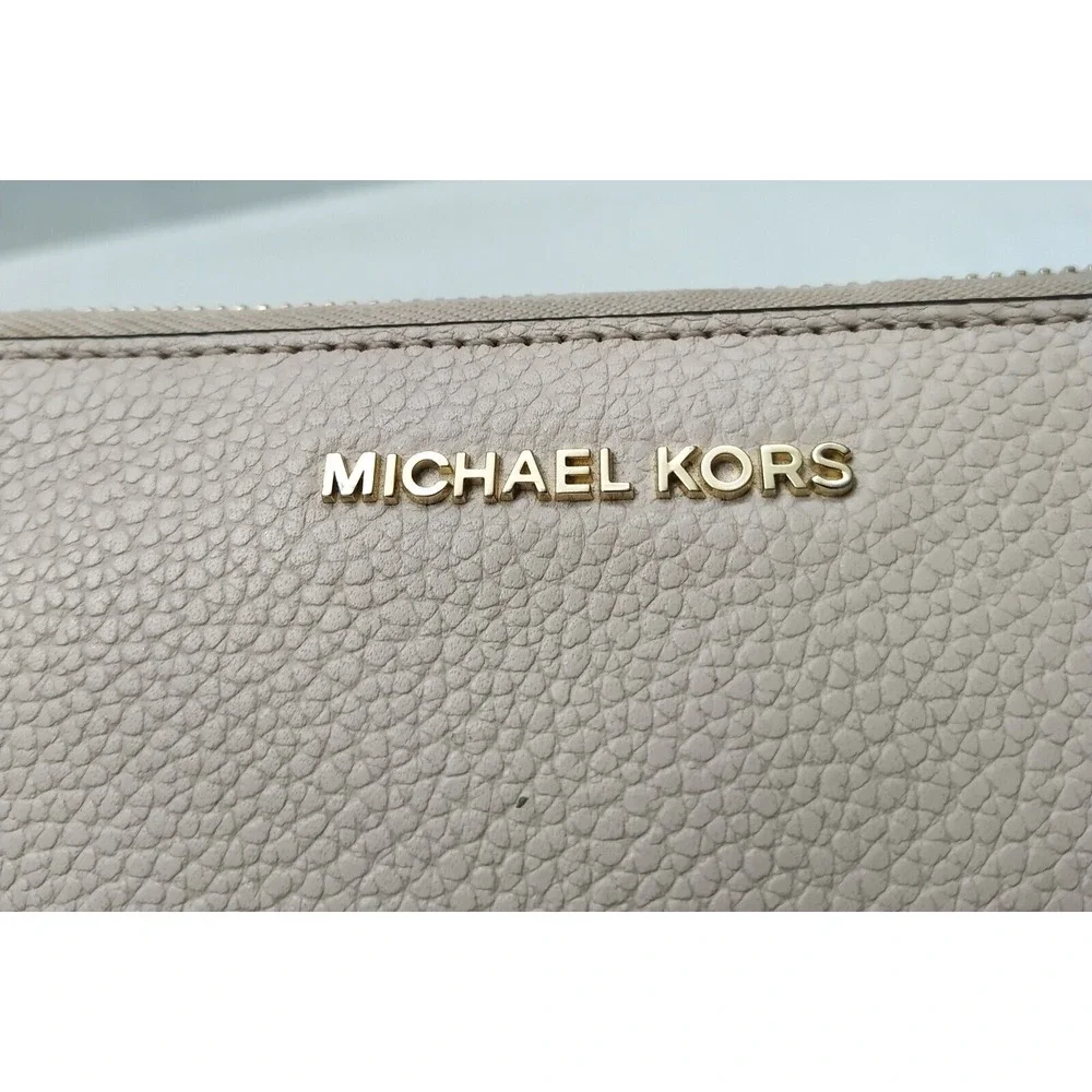 Michael Kors Light Pink Pebbled Leather Zip Around Credit Card ID Window Wallet